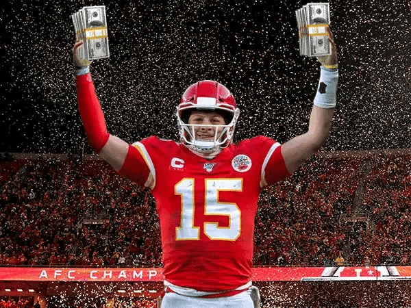 athlete waving stacks of cash