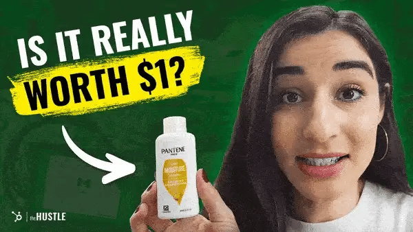 A dark-haired woman holds up a miniature shampoo bottle, with “Is it really worth $1?” written atop and an arrow pointing to the bottle.